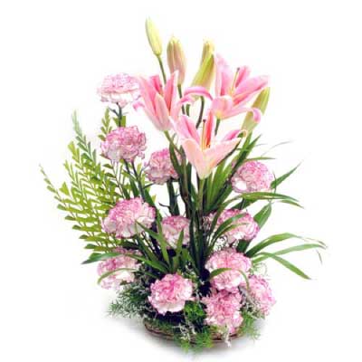 Pink Carnations and Oriental Lilies in a Basket - for online delivery for your love - birthday anniversary congratulations good-luck - free urgent delivery India - Delhi Mumbai Bangalore Pune Hyderabad Chennai Kolkata Ahmedabad NOIDA Gurugram