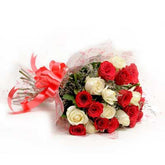 Bouquet of 25 red and white rose flowers with white fillers in a Nice Wrapping - for birthday anniversary valentine congratulations good-luck - free urgent delivery India - Delhi Mumbai Bangalore Pune Hyderabad Chennai Kolkata Ahmedabad