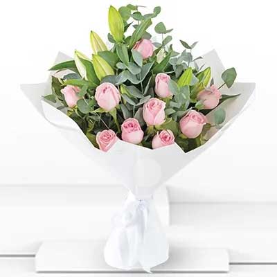 Bouquet of Pink roses and White Lilies Luxuriously wrapped - for online delivery for your love - birthday anniversary congratulations good-luck - free urgent delivery India - Delhi Mumbai Bangalore Pune Hyderabad Chennai Kolkata Ahmedabad NOIDA Gurugram