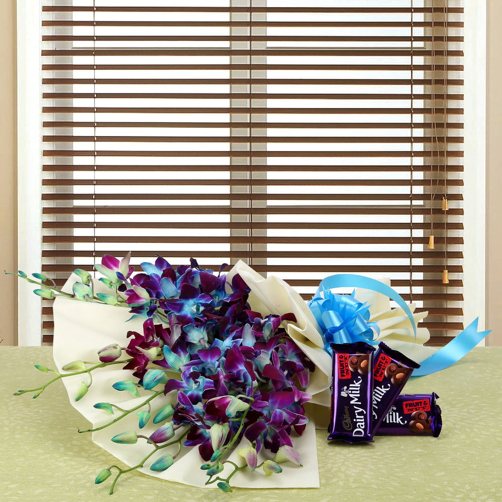 Combo of Blue Orchids with Chocolates or Truffle Cake