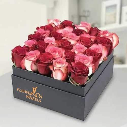30 Stems of Red and Pink Roses with Fillers in a Square Box.