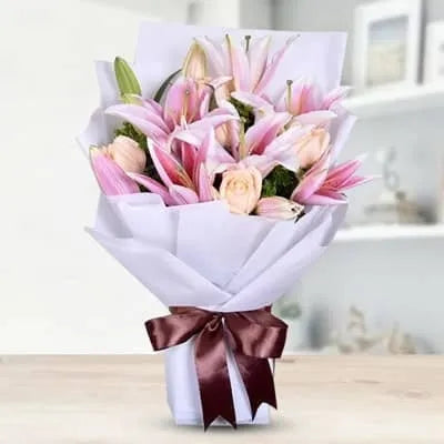 Bouquet of Peach roses with Pink Lilies Luxury Wrapping - for online delivery for your love - birthday anniversary congratulations good-luck - free urgent delivery India - Delhi Mumbai Bangalore Pune Hyderabad Chennai Kolkata Ahmedabad NOIDA Gurugram