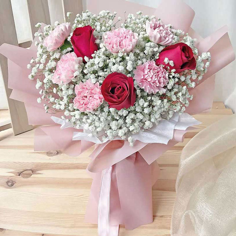 Elegant Mix of Red Roses and Light Pink Carnations with White Fillers
