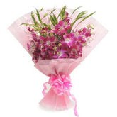 Bouquet of 6 purple orchids in a pink paper wrapping - for birthday anniversary valentine congratulations good-luck - free urgent delivery India - Delhi Mumbai Bangalore Pune Hyderabad Chennai Kolkata Ahmedabad