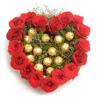 Red Roses and Ferrero Rocher chocolates in a Heart Shaped Basket.