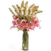Bouquet of 6 pink oriental lilies and 10 tube roses arranged in a glass vase - for birthday anniversary valentine congratulations good-luck - free urgent delivery India - Delhi Mumbai Bangalore Pune Hyderabad Chennai Kolkata Ahmedabad
