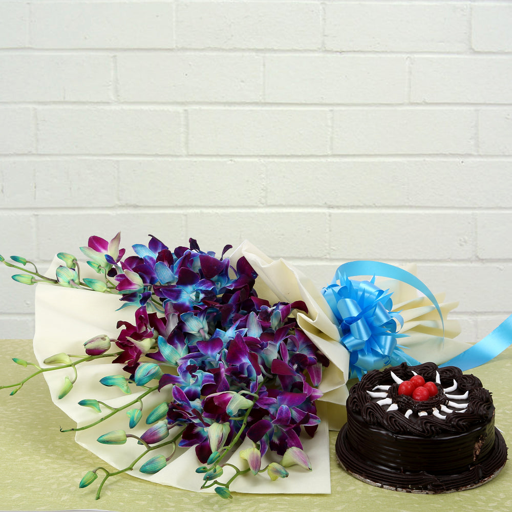 Bouquet of blue orchids in luxury wrapping with chocolate cake - for birthday anniversary valentine congratulations good-luck - free urgent delivery India - Delhi Mumbai Bangalore Pune Hyderabad Chennai Kolkata Ahmedabad