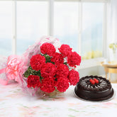 Bouquet of red carnation flowers with chocolate cake- for birthday anniversary valentine congratulations good-luck - free urgent delivery India - Delhi Mumbai Bangalore Pune Hyderabad Chennai Kolkata Ahmedabad