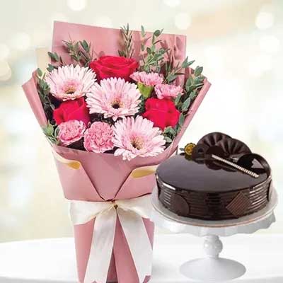 Bouquet of exotic flowers in luxury wrapping with chocolate truffle cake- for online delivery for your love - birthday anniversary congratulations good-luck - free urgent delivery India - Delhi Mumbai Bangalore Pune Hyderabad Chennai Kolkata Ahmedabad NOIDA Gurugram