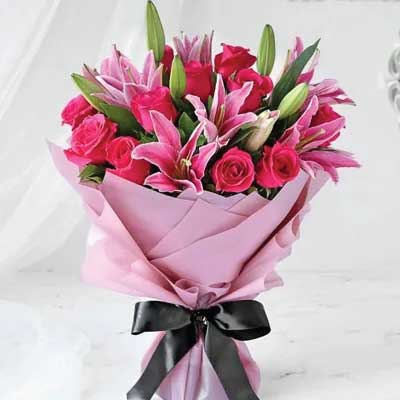 Bouquet of Pink Lilies and Pink Roses in luxury wrapping - for online delivery for your love - birthday anniversary congratulations good-luck - free urgent delivery India - Delhi Mumbai Bangalore Pune Hyderabad Chennai Kolkata Ahmedabad NOIDA Gurugram