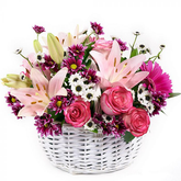 Charming basket arrangement of lilies, daisies, gerberas and rose flowers with white fillers in luxury wrapping - for birthday anniversary valentine congratulations good-luck - free urgent delivery India - Delhi Mumbai Bangalore Pune Hyderabad Chennai Kolkata Ahmedabad