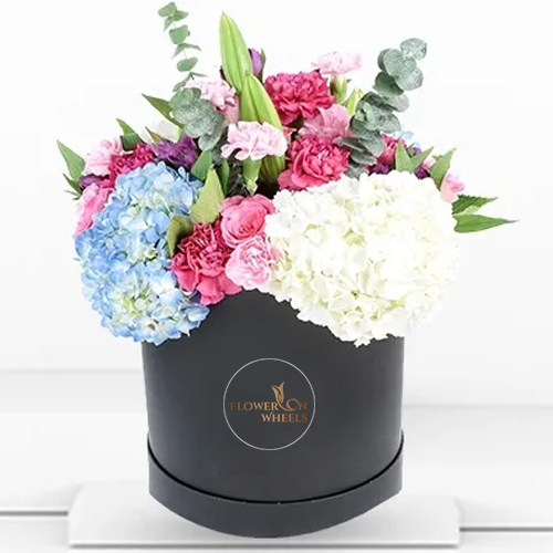 Luxury basket of blue and white hydrangeas with pink carnations and white lily flowers - for birthday anniversary valentine congratulations good-luck - free urgent delivery India - Delhi Mumbai Bangalore Pune Hyderabad Chennai Kolkata Ahmedabad